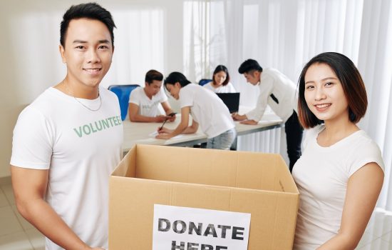 People-carrying-donation-box-gh2lyup.jpg